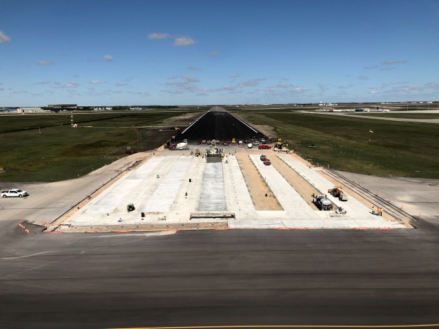 Overview of the Runway Rehabilitation Project with the airfield in the background