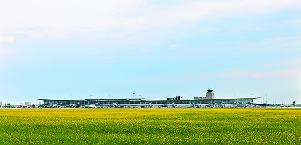 Exterior photo of the airport in the summer