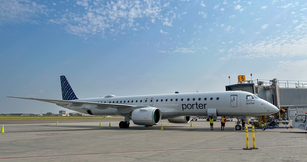 Porter Airlines’ Embraer E195-E2 aircraft parked at Gate 6 at Winnipeg Richardson International Airport.